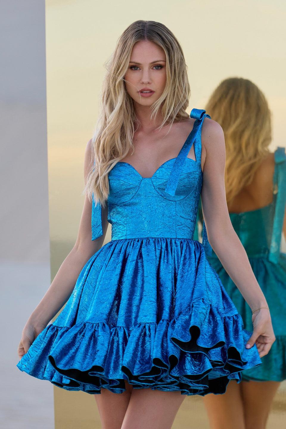 sherri hill Metallic brocade cocktail dress with a sweetheart neckline bow sleeves and ruffle hem