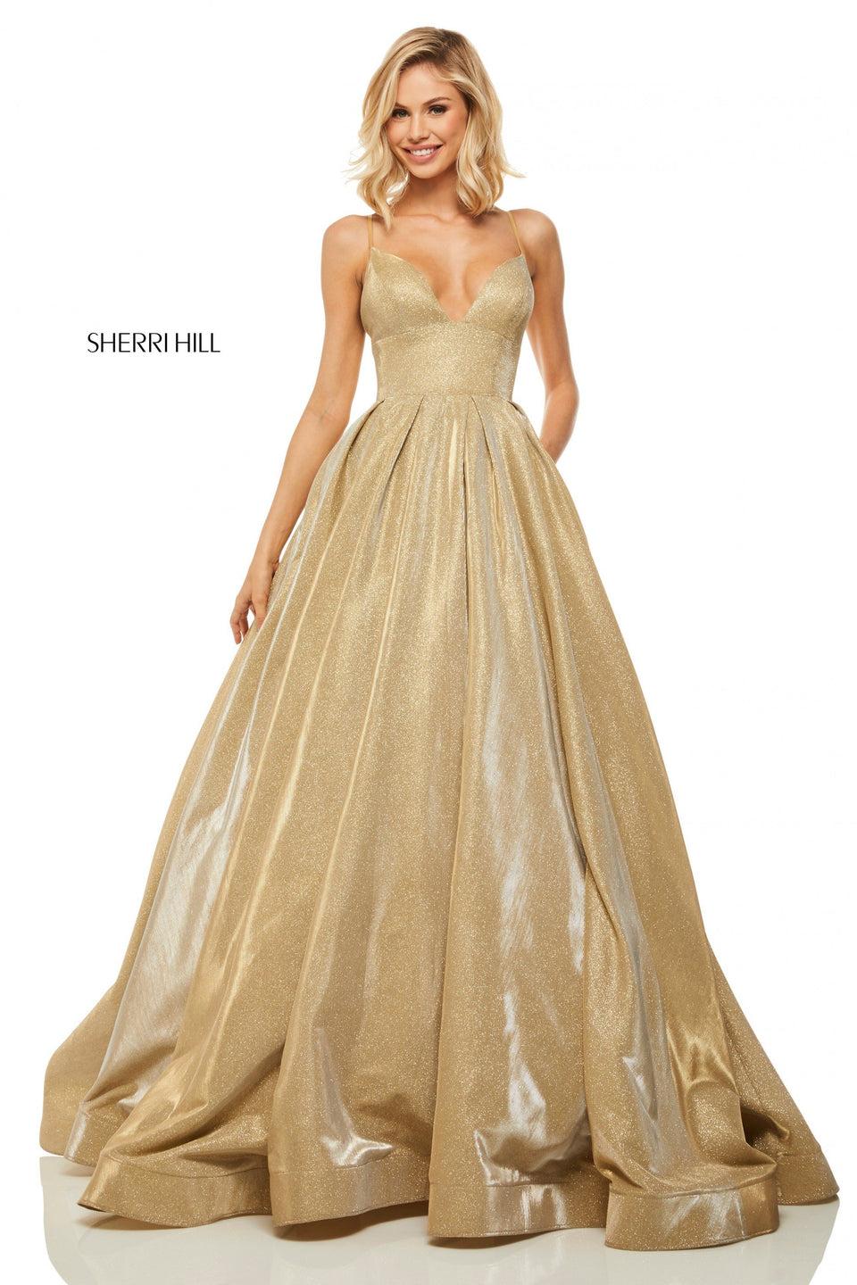 sherri hill Metallic gold ball gown with spaghetti straps and lace up back bodice