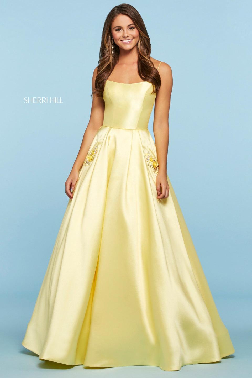 sherri hill Mikado ball gown with rounded neckline back cut out jeweled button back and embellished pockets