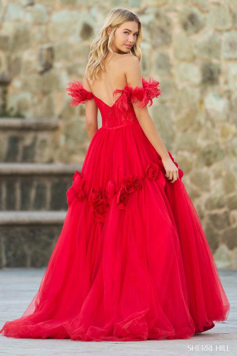 Sherri Hill Off The Shoulder Ball Gown With A Lace Corset Top Feathered Sleeves And Tulle Skirt With Rose Pedal Embellishments
