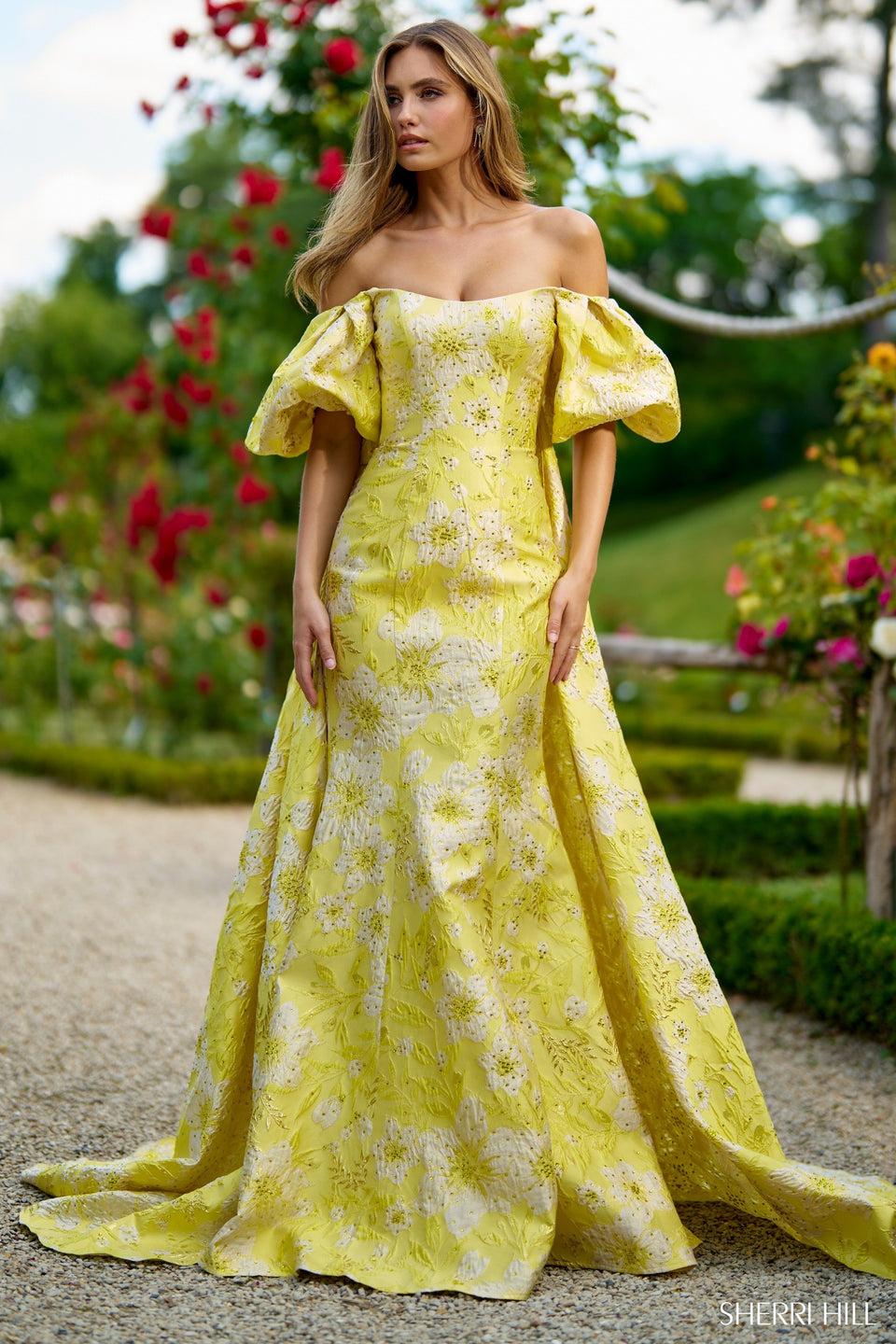 sherri hill Off the shoulder mermaid brocade dress with balloon sleeves and a cape