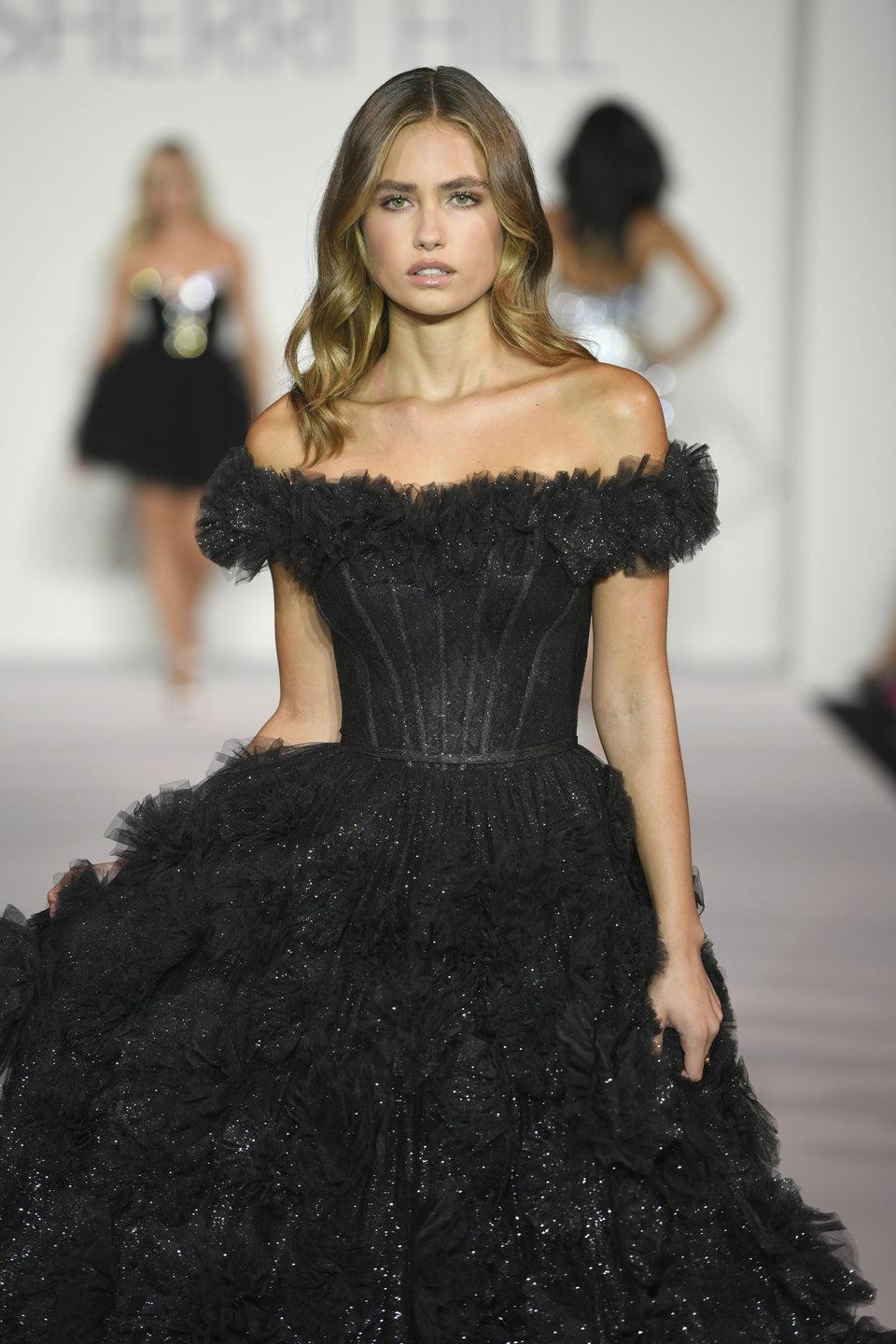 sherri hill Off the shoulder sparkle ball gown with a corset bodice ruffle embellished skirt and a ruffled bodice hem