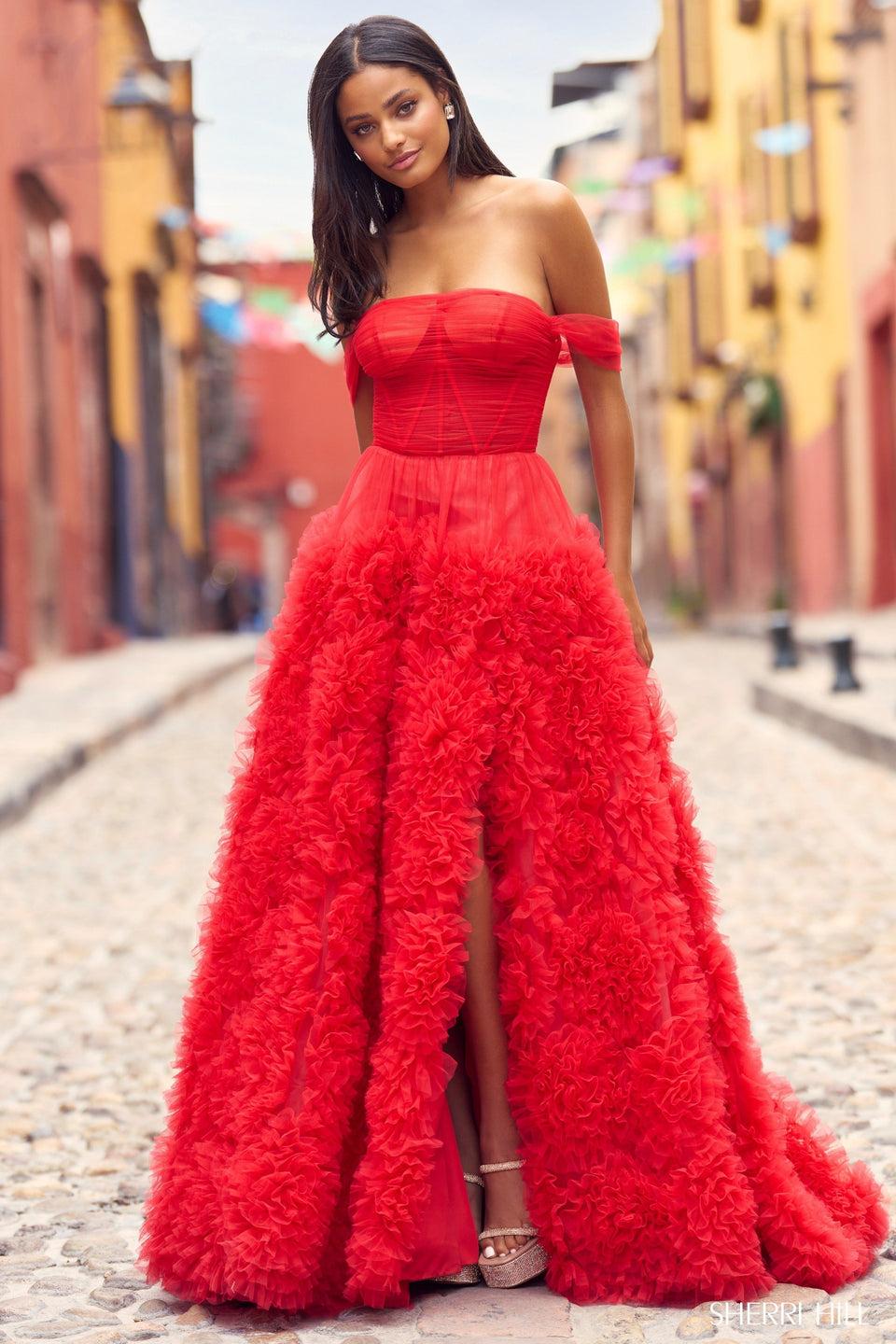 sherri hill Off the shoulder tulle ball gown with ruffle embellishments and high slit