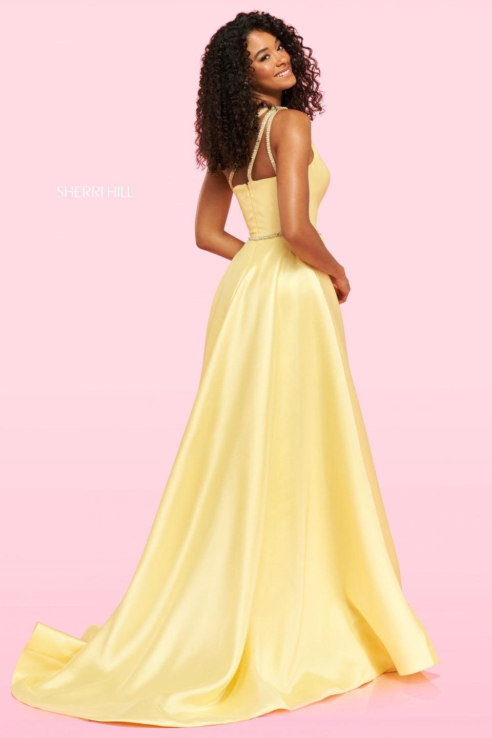 Sherri Hill One Shoulder Mikado Gown With A High Ruffle Skirt Slit And A Thin Beaded Belt
