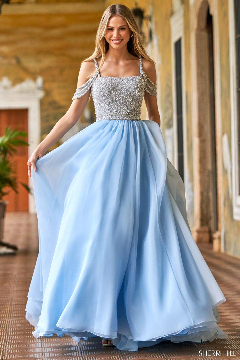sherri hill Organza ball gown with pearl beaded bodice and draping sleeves