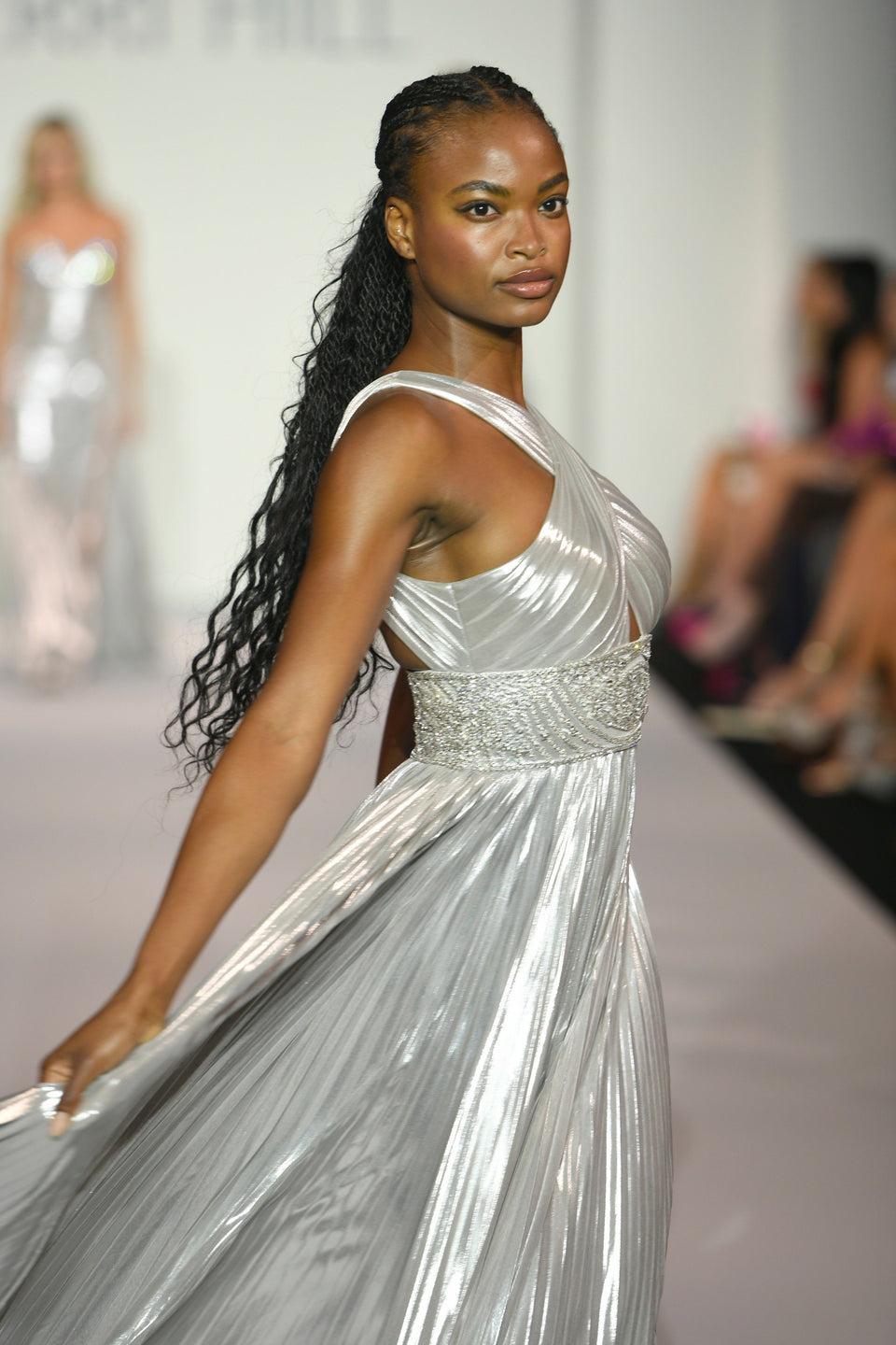 sherri hill Pleated metallic gown with criss cross neckline beaded waist and skirt slit