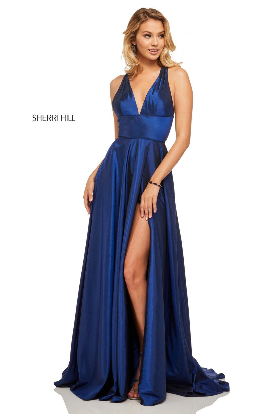 sherri hill Rich metallic A-line with skirt slit deep-V neckline and criss-cross back