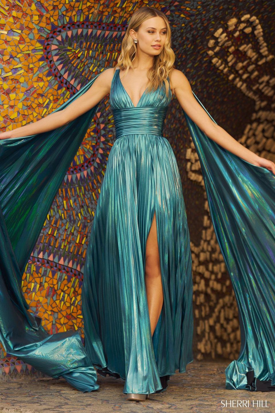 Sherri Hill Rich Metallic Pleated A-line Gown With Cape And Skirt Slit