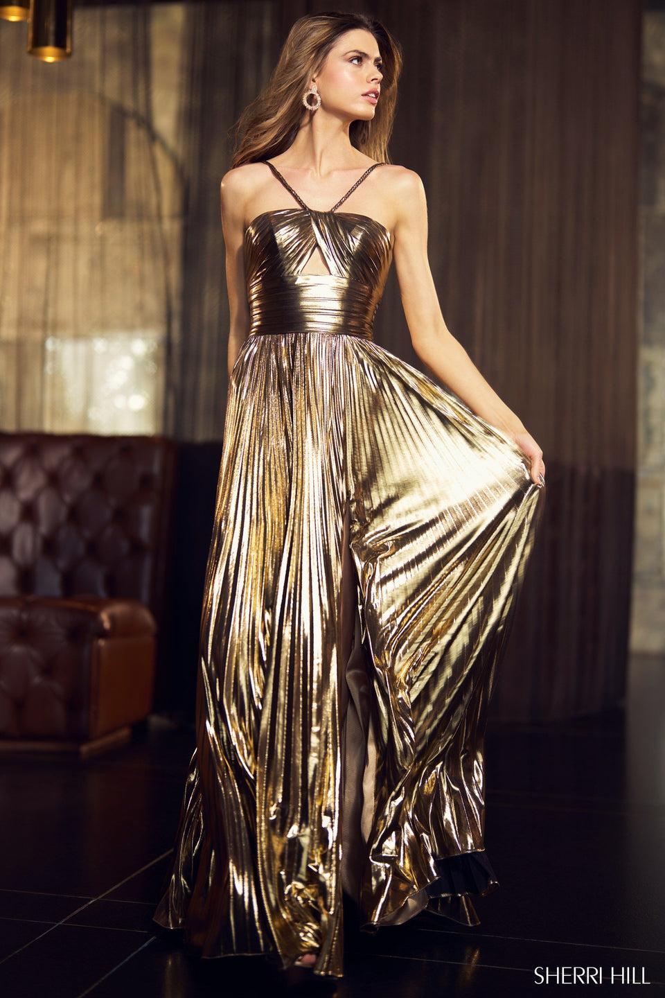 sherri hill Rich metallic pleated gown with key hole bodice braided straps and high skirt slit