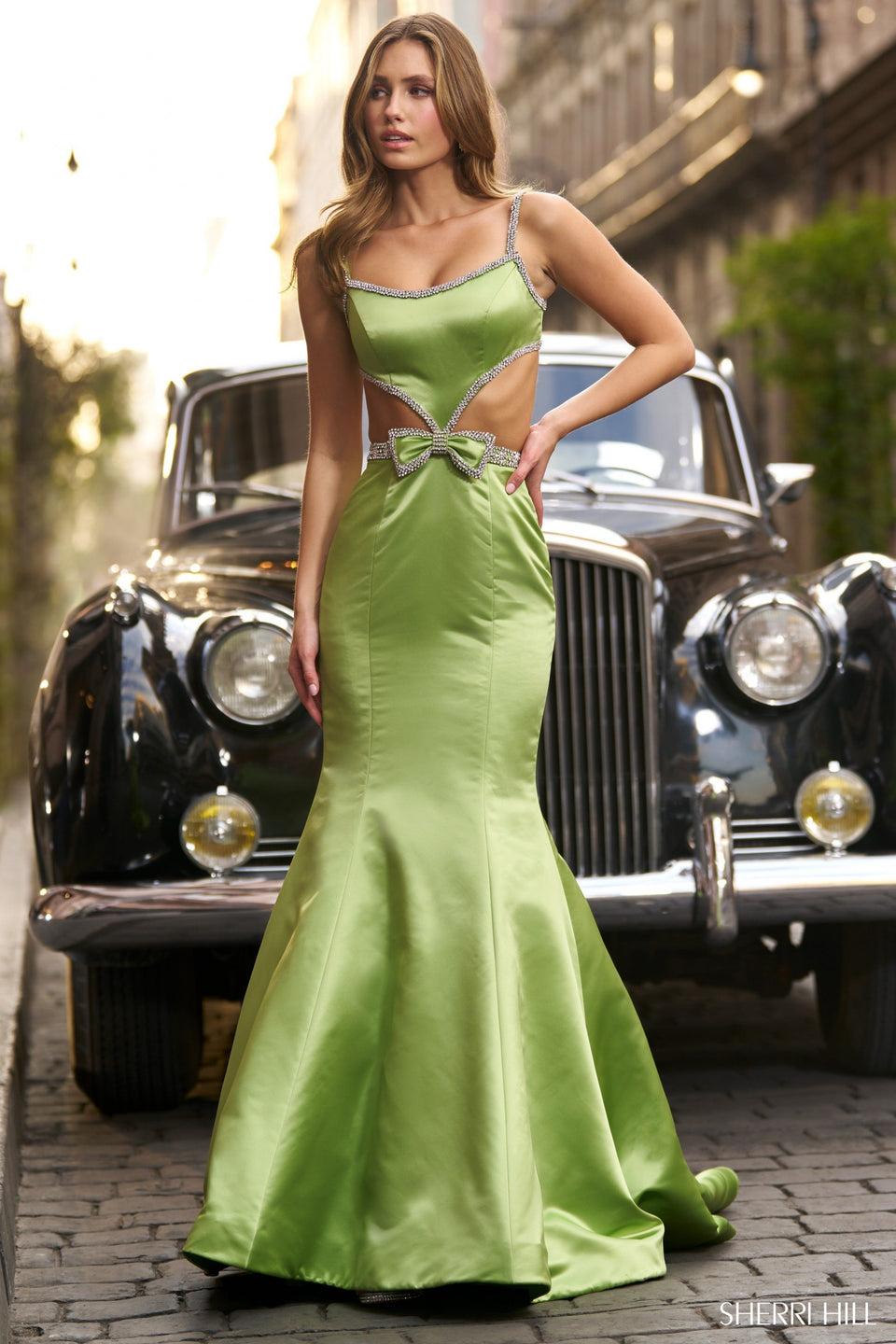 Sherri Hill Satin Mermaid Gown With Cut Outs Bow And Bead Embellishments And An Open Back