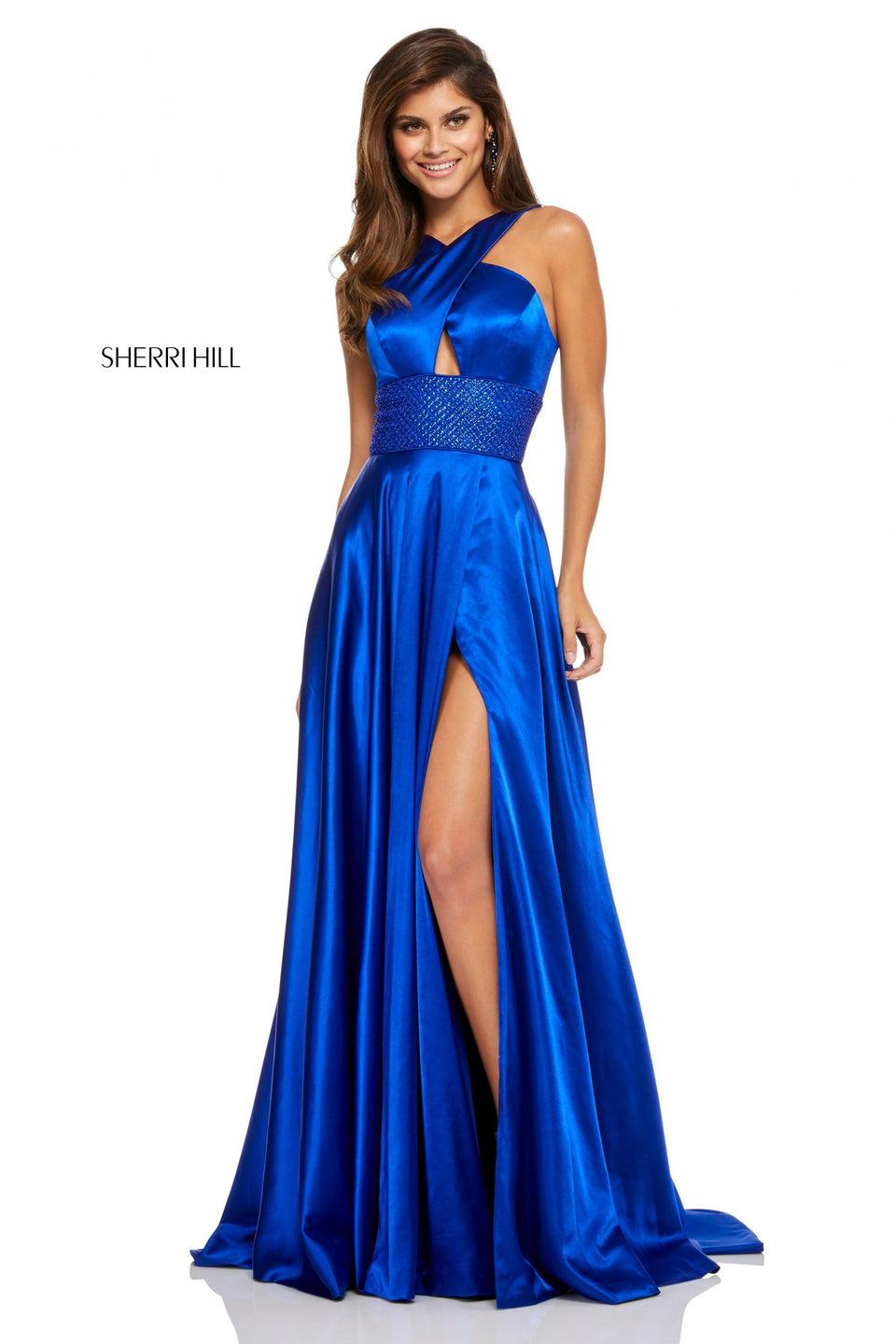 sherri hill Silk charmeuse gown with a criss cross halter and beaded waist band