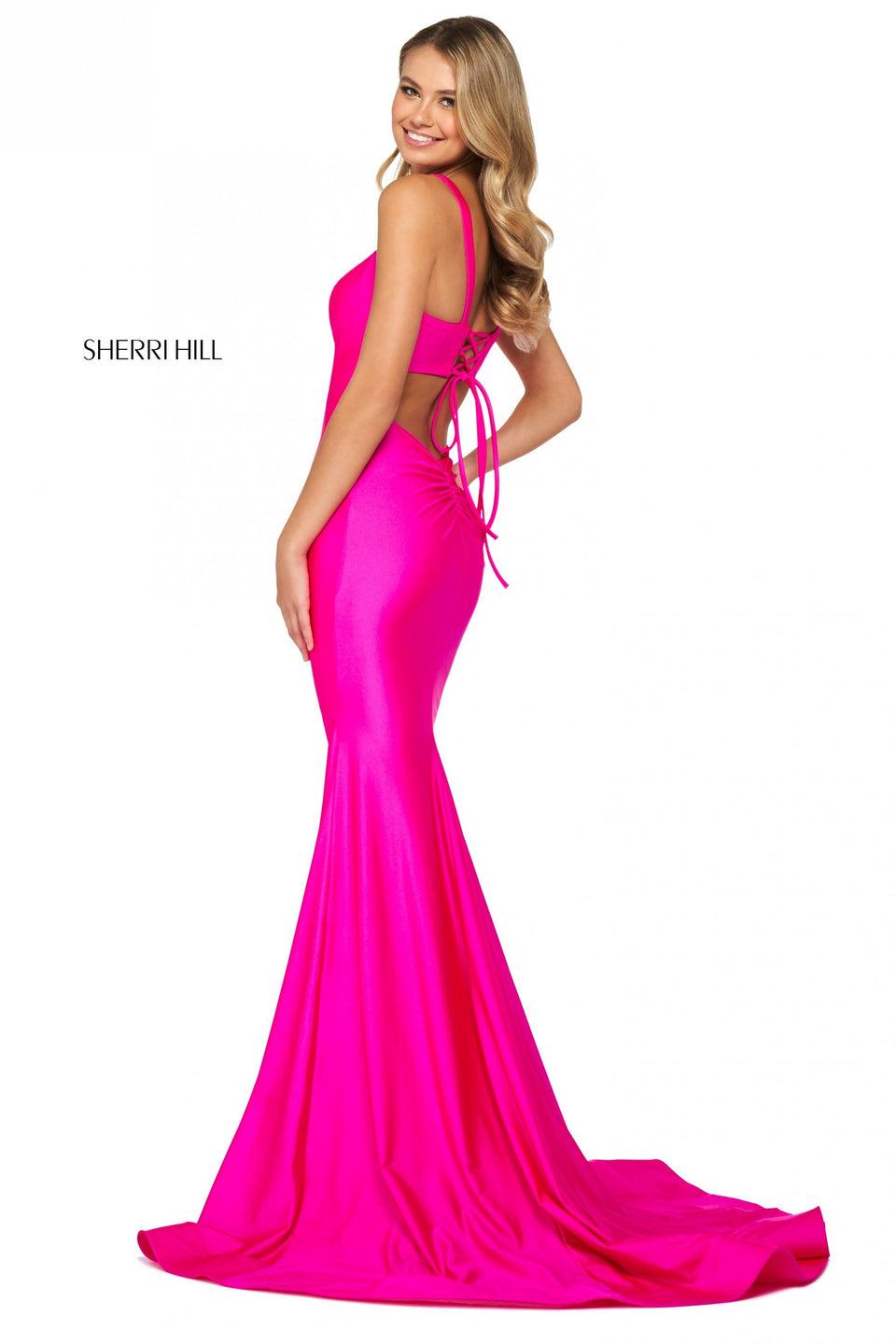 sherri hill Silky stretch jersey gown with straight neckline lace up back and lower back cut out and ruching
