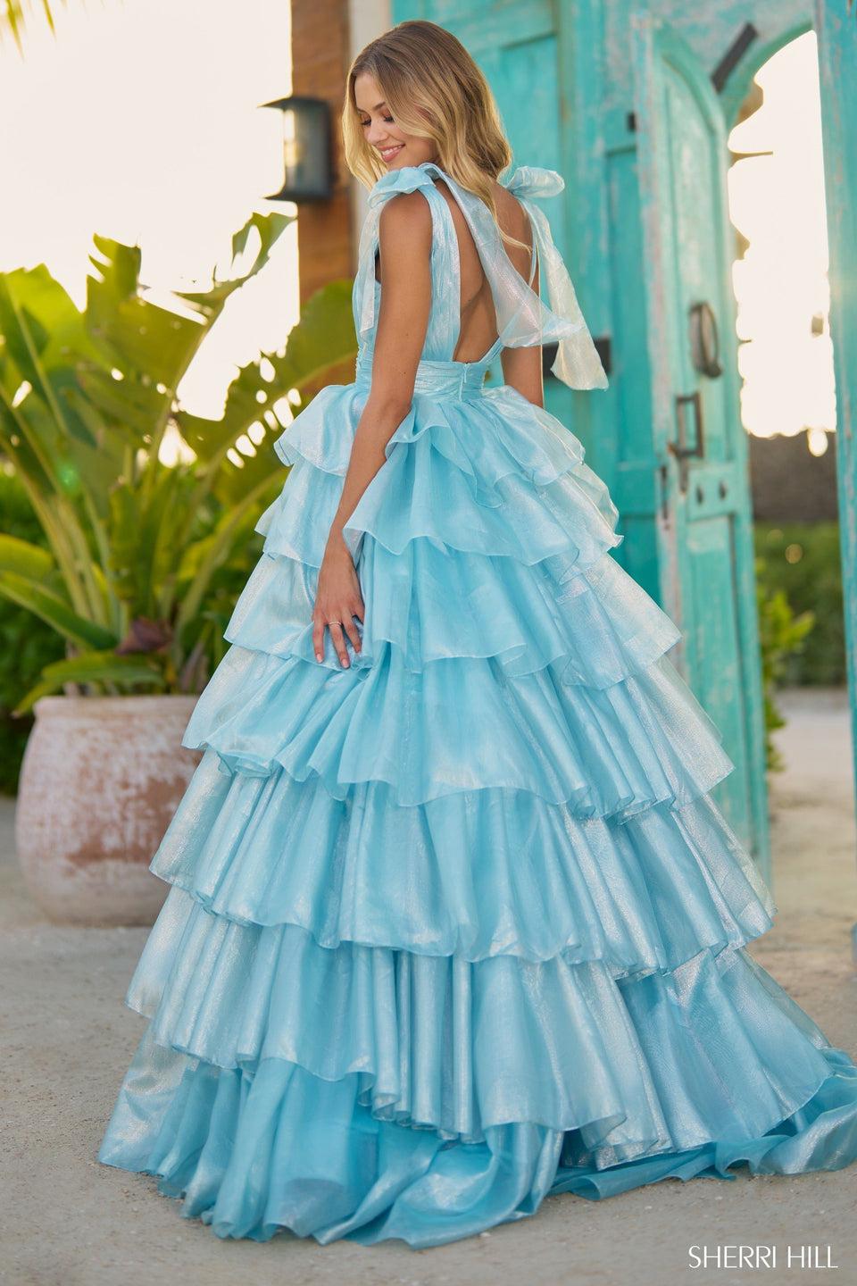 Sherri Hill Sparkle LamÃ© Ball Gown With Ruffle Skirt Bow Embellished Straps And Skirt Slit