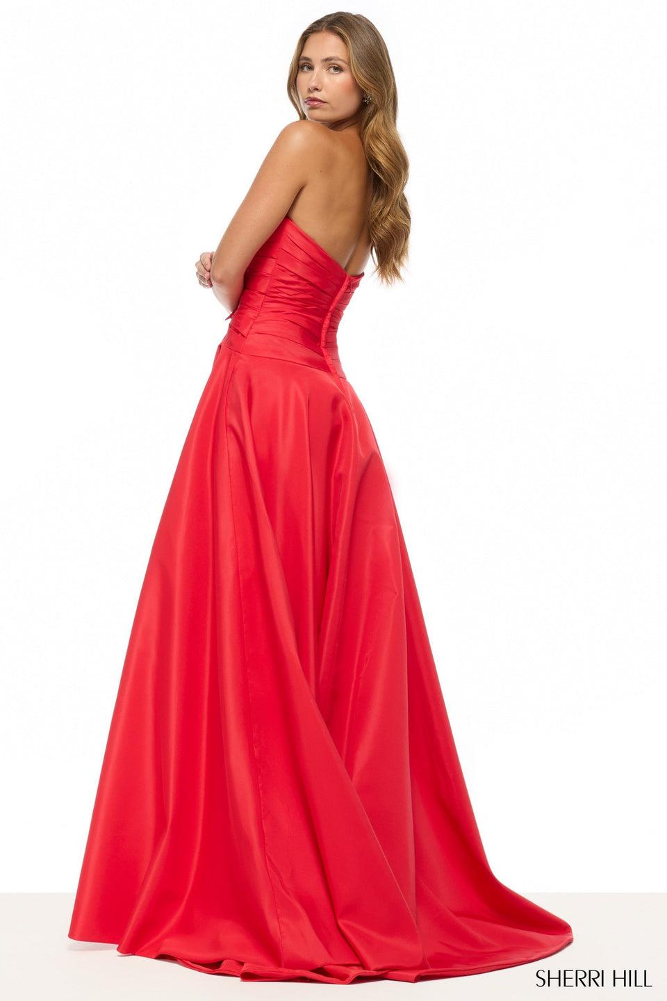 Sherri Hill Strapless A-line Gown With Cutouts Bows And A Skirt Slit