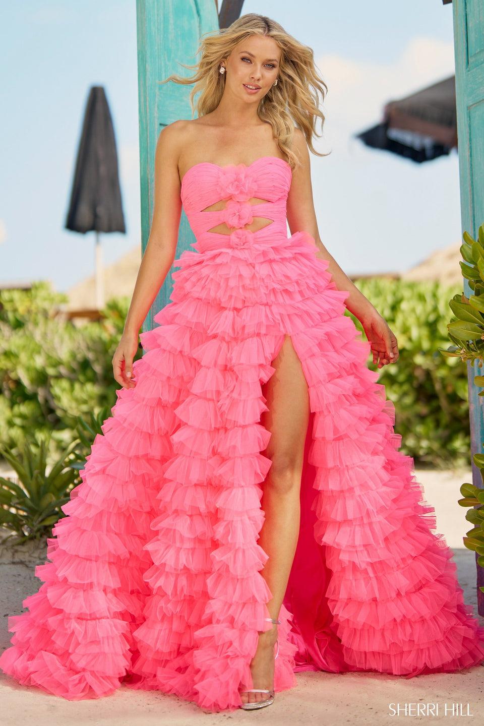 Sherri Hill Strapless Ball Gown With Key Holes Rosette Embellishments And A Tulle Ruffle Skirt With Slit
