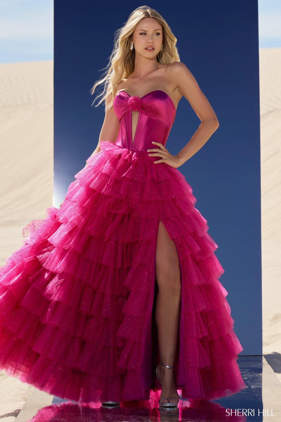 sherri hill Strapless ball gown with keyhole bodice tulle ruffle skirt and high slit