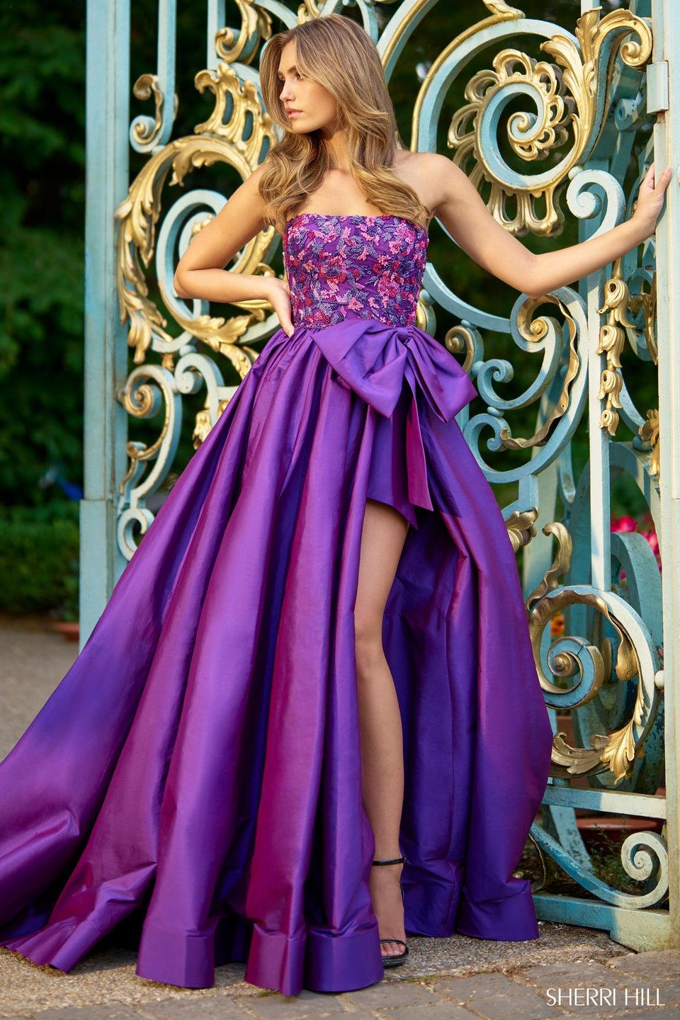 sherri hill Strapless ballgown with beaded bodice and taffeta skirt with bow and slit
