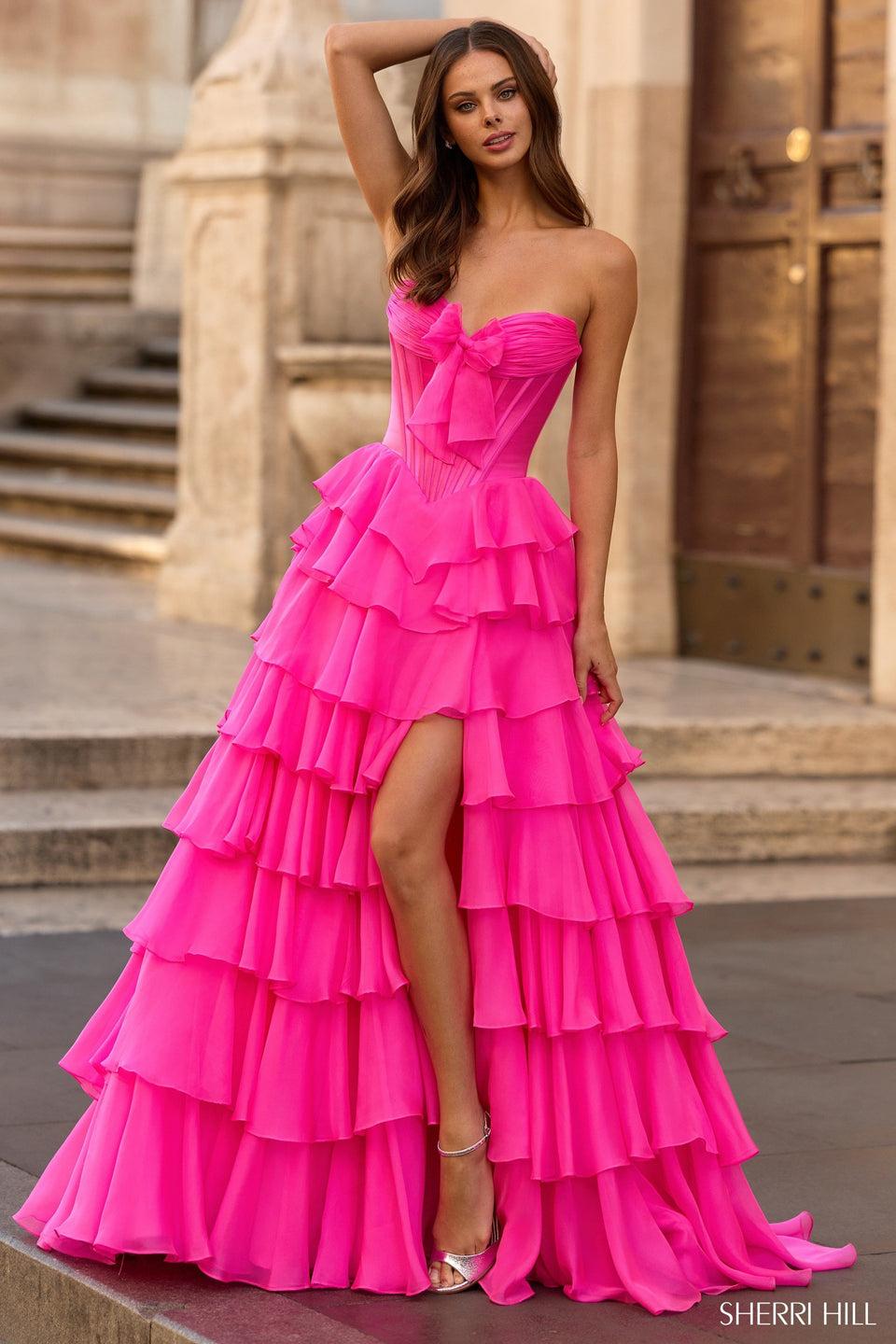 sherri hill Strapless ballgown with corset bodice and chiffon ruffle skirt with slit