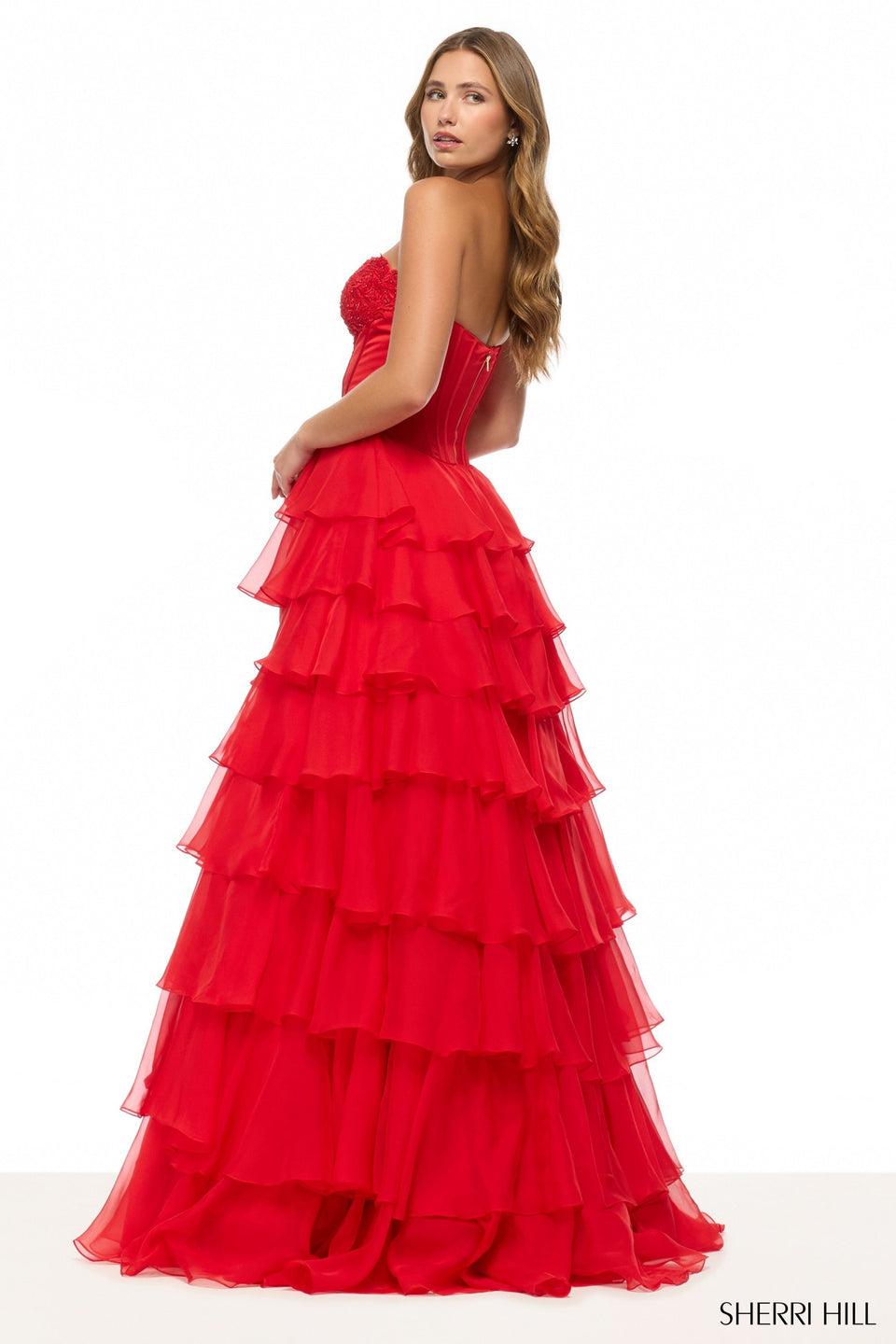 Sherri Hill Strapless Ballgown With Corset Bodice Leaf Lace Details And A Chiffon Ruffle Skirt With Slit