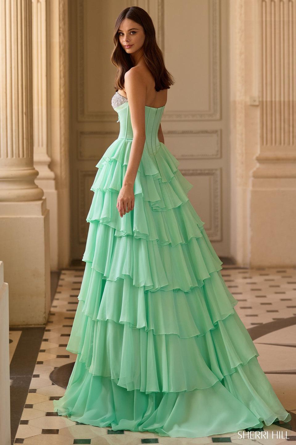Sherri Hill Strapless Ballgown With Corset Bodice Pearl And Bead Embellishments And A Chiffon Ruffle Skirt With Slit