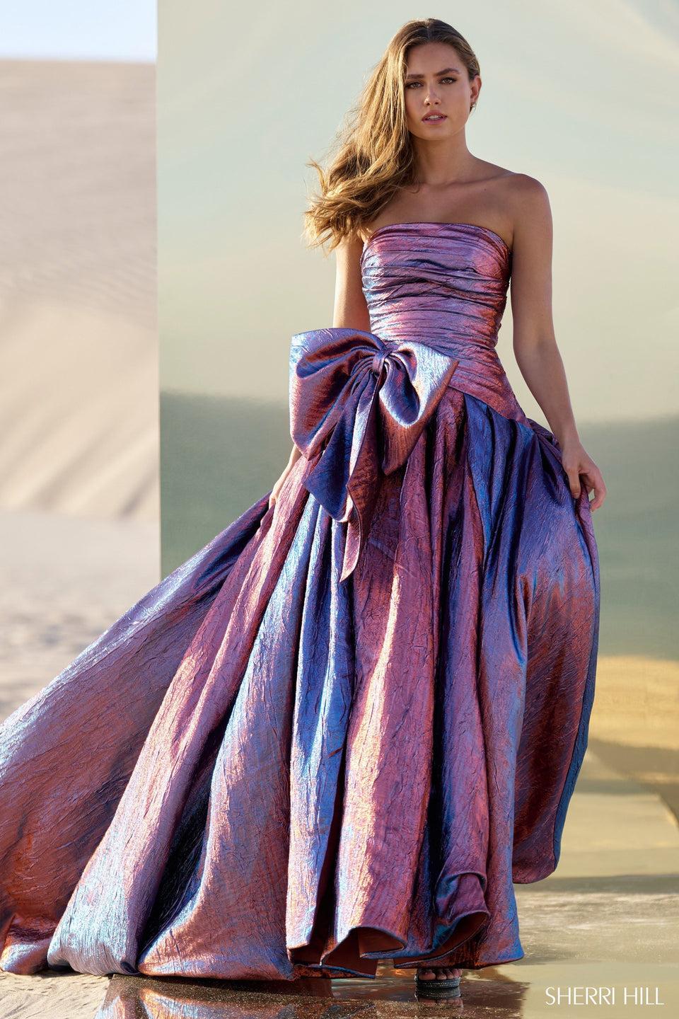 sherri hill Strapless brocade gown with bow on waistline and skirt slit
