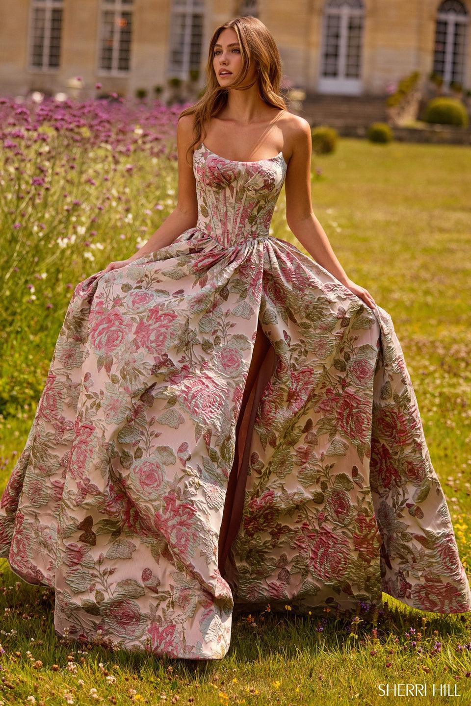 sherri hill Strapless brocade gown with corset bodice and a skirt slit