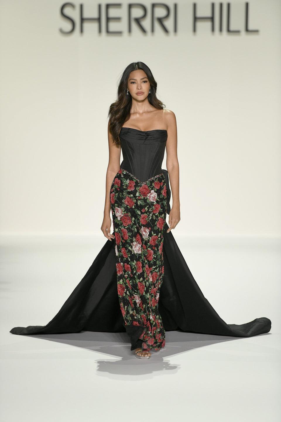 sherri hill Strapless fitted gown with corset bodice and beaded floral skirt with taffeta cape