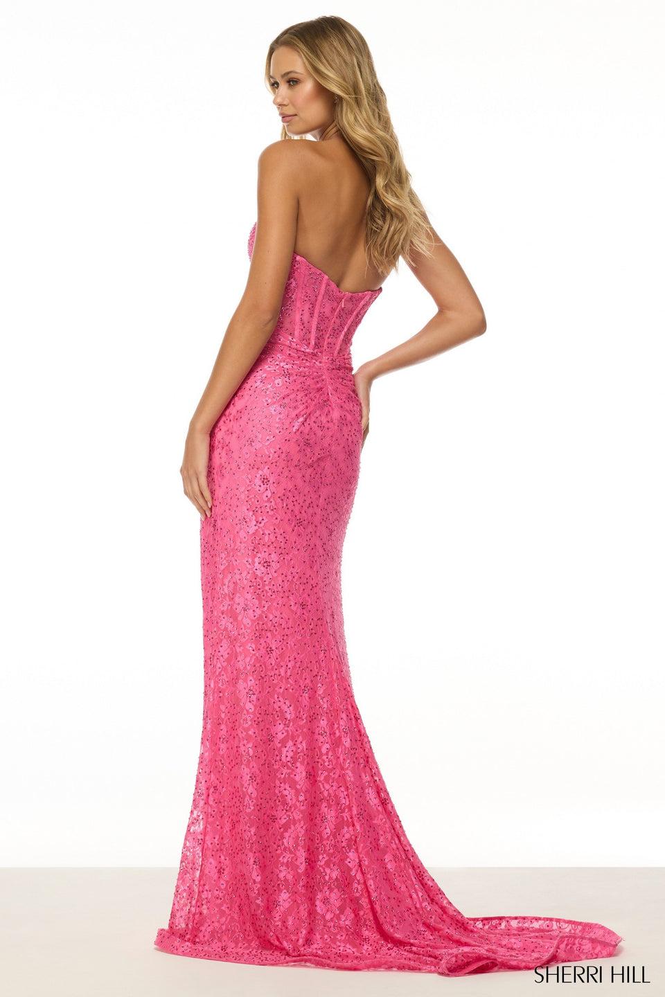 Sherri Hill Strapless Fitted Lace Gown With Corset Bodice Skirt Slit Rosette Embellishment And A Keyhole