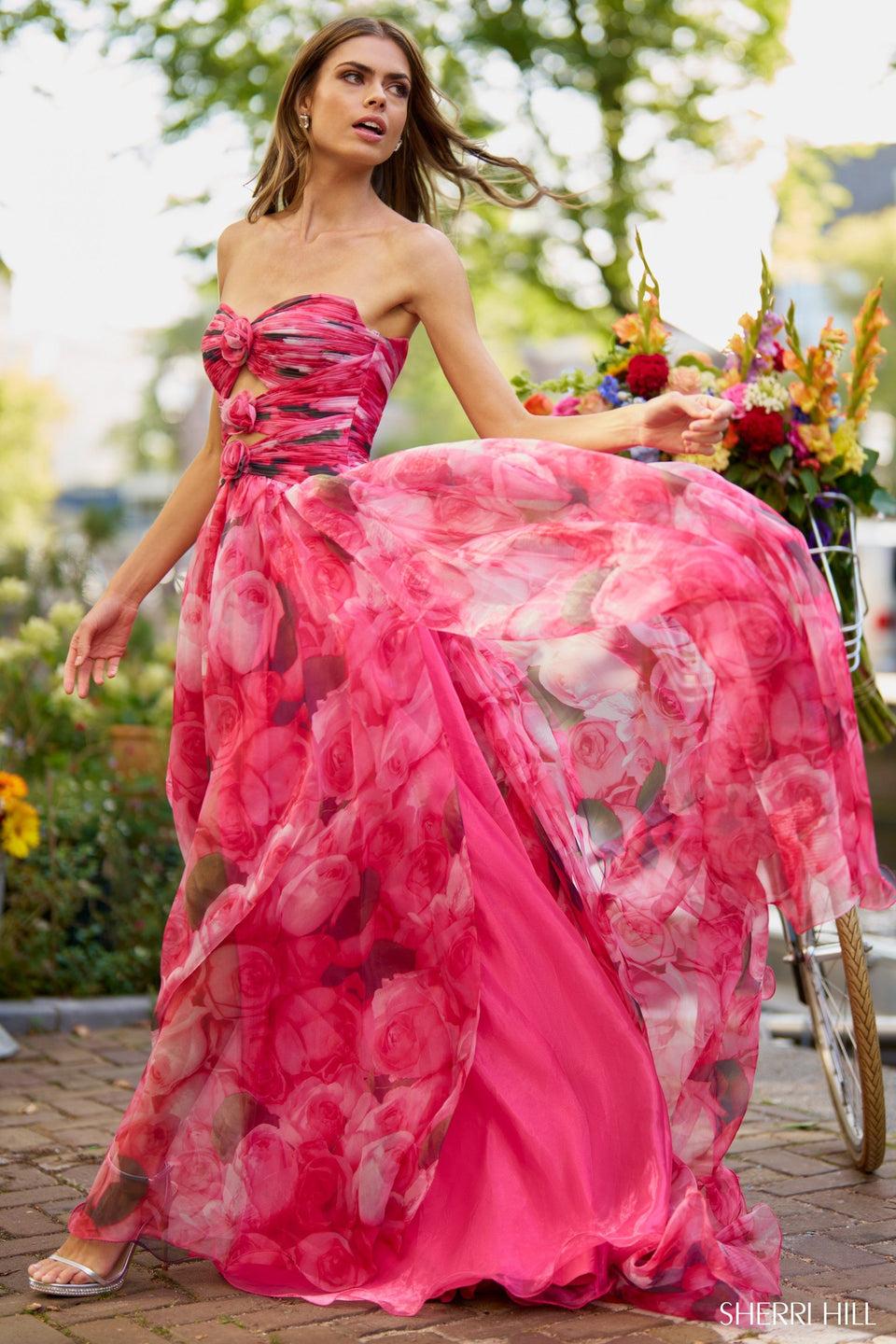 sherri hill Strapless floral A-Line gown with key holes rosette embellishments and a skirt slit