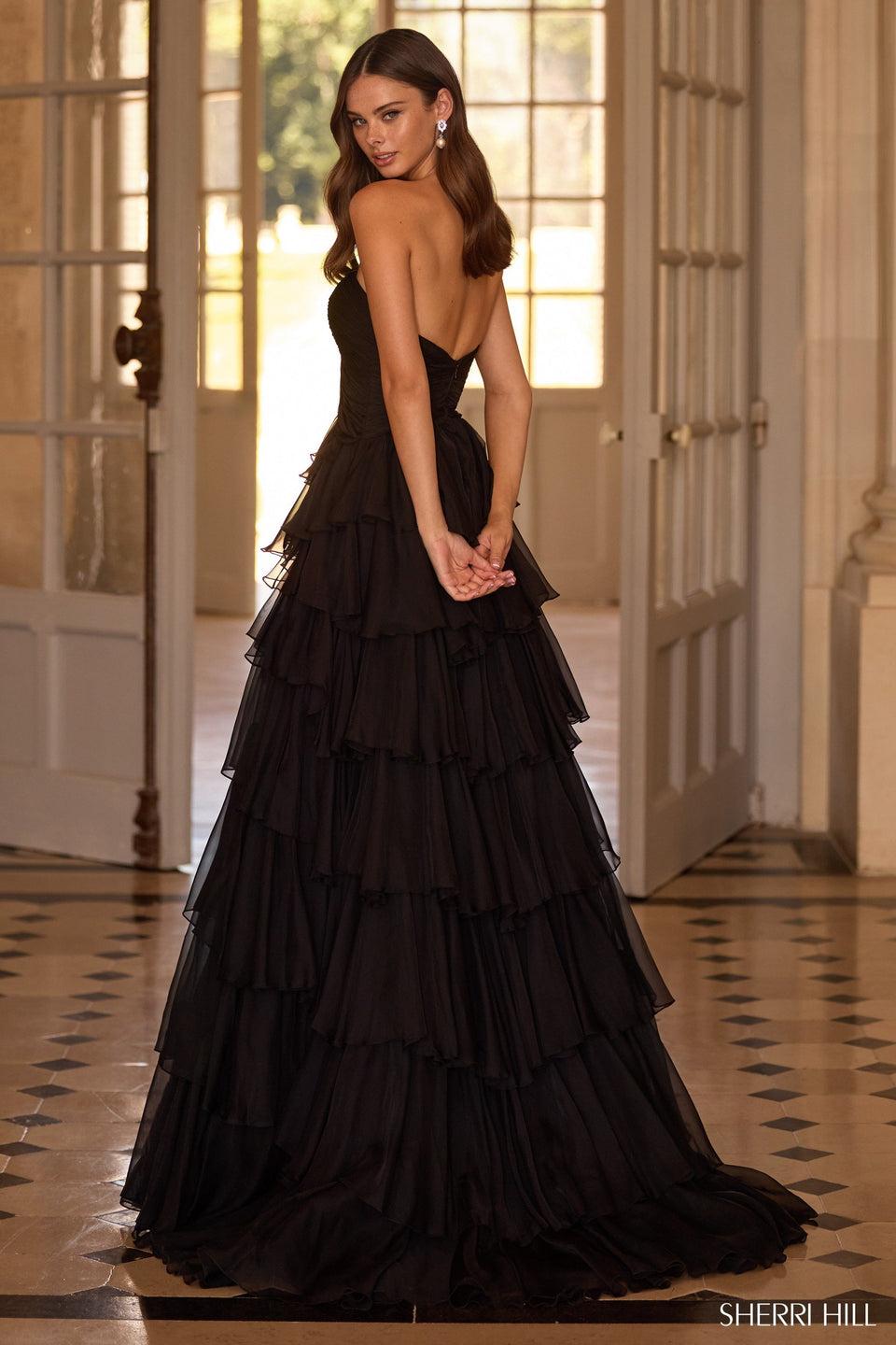 Sherri Hill Strapless Gown With A Chiffon Ruffle Skirt And A Slit