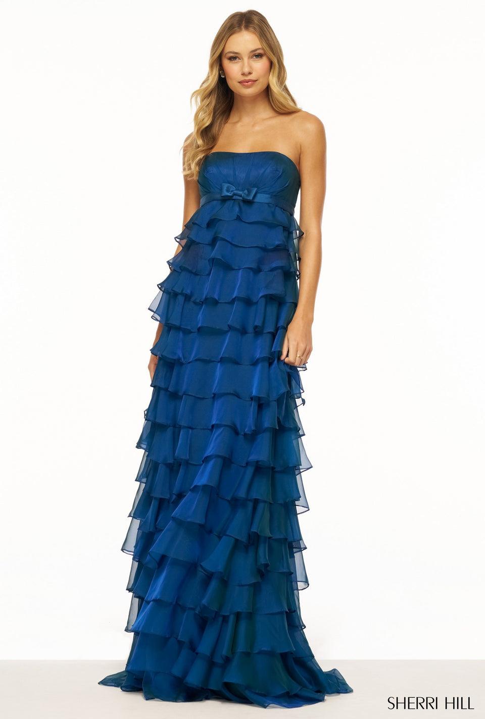sherri hill Strapless gown with ruffle skirt and bow embellishment