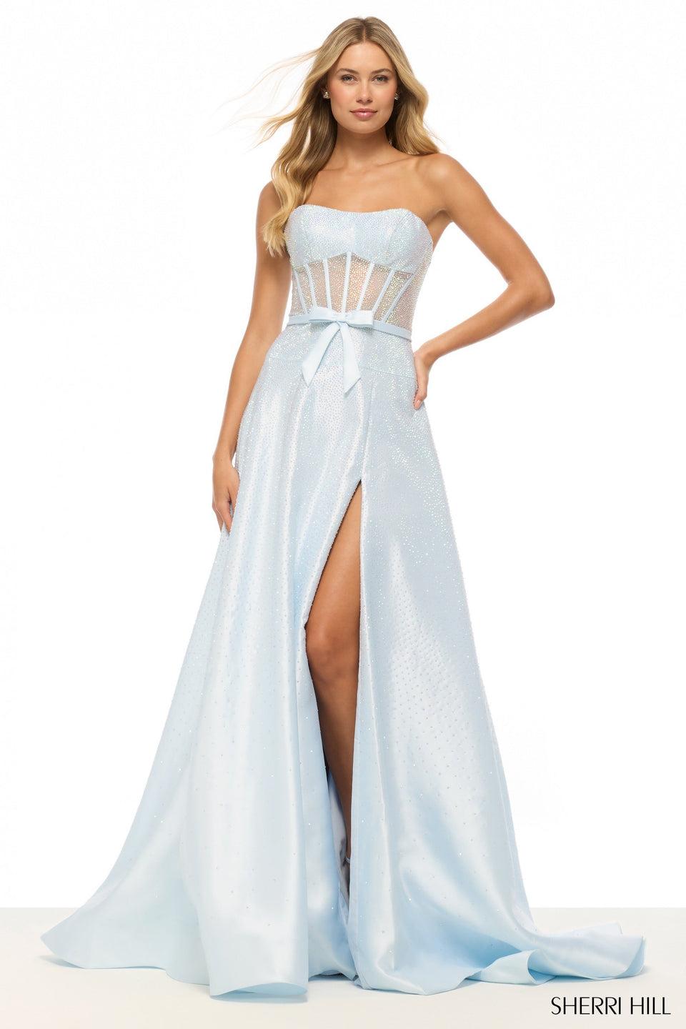 sherri hill Strapless hot fix gown with corset bodice drop waist bow and a skirt slit