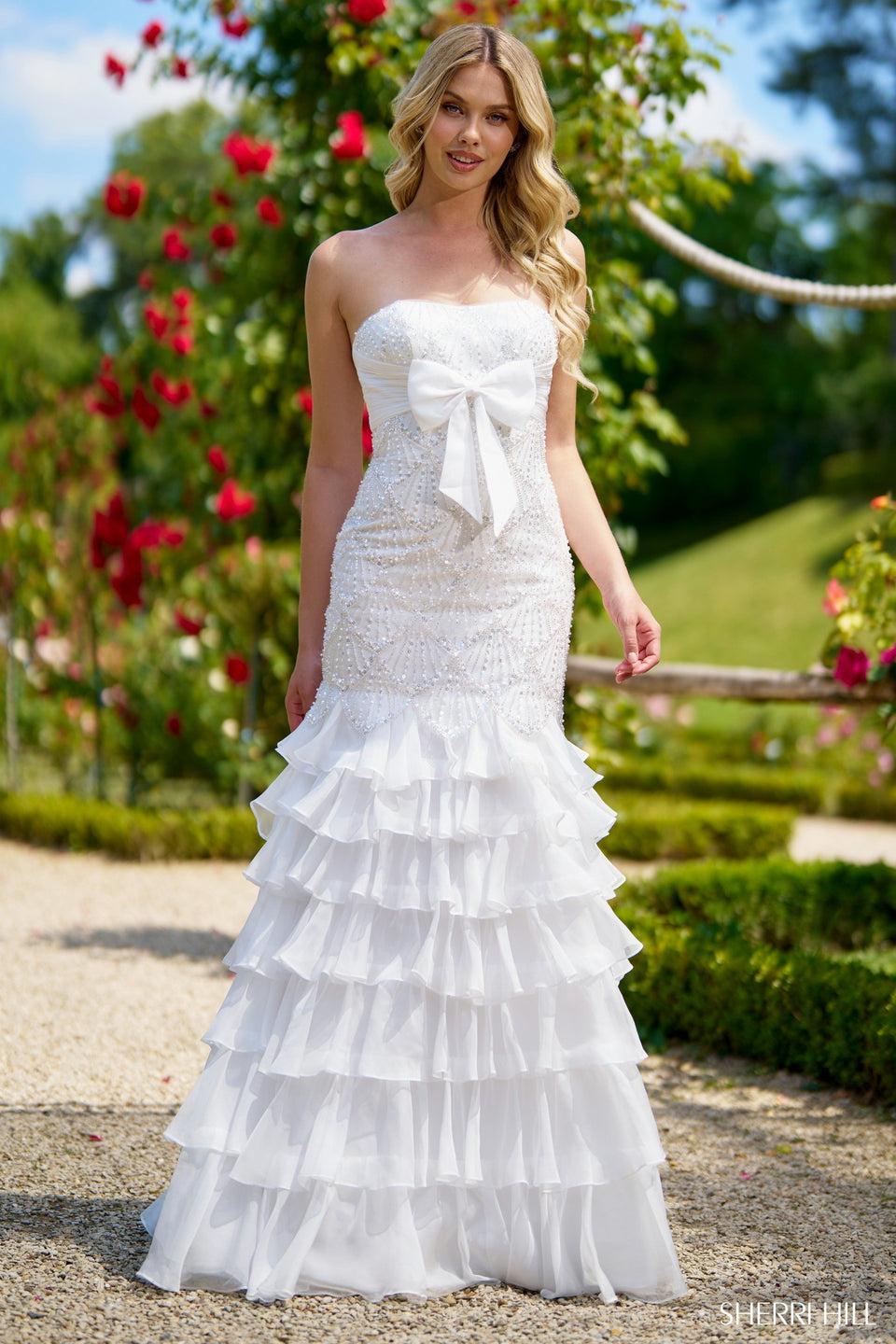 sherri hill Strapless pearl gown with bow and chiffon ruffle skirt