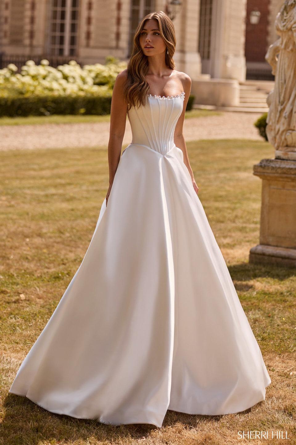 sherri hill Strapless satin ballgown with corset bodice and pearl embellishments
