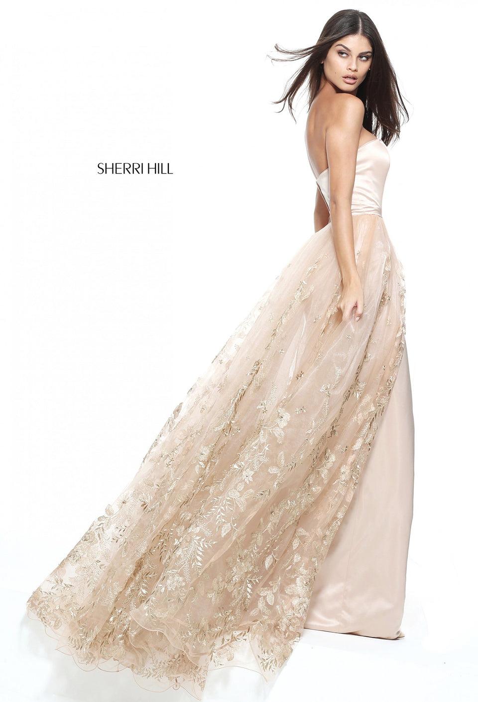 sherri hill Strapless satin column gown with a tulle and gold floral applique over skirt