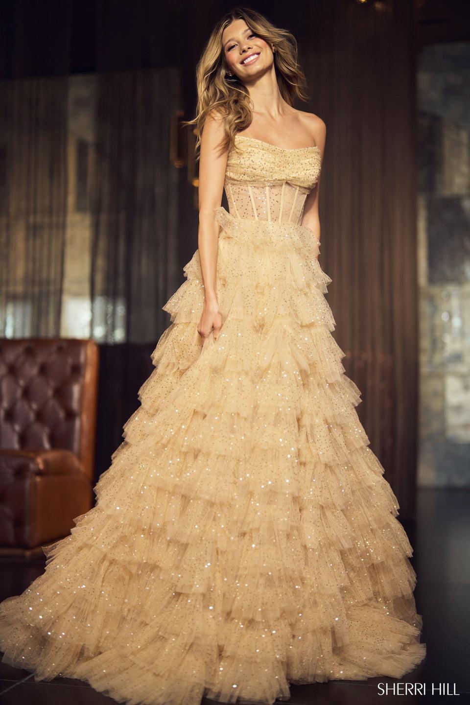 sherri hill Strapless sequin tulle ball gown with sheer corset bodice and ruffle skirt