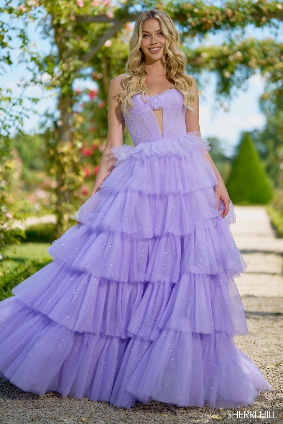 sherri hill Strapless sparkle tulle ballgown with ruffle skirt keyhole and rosette embellishment