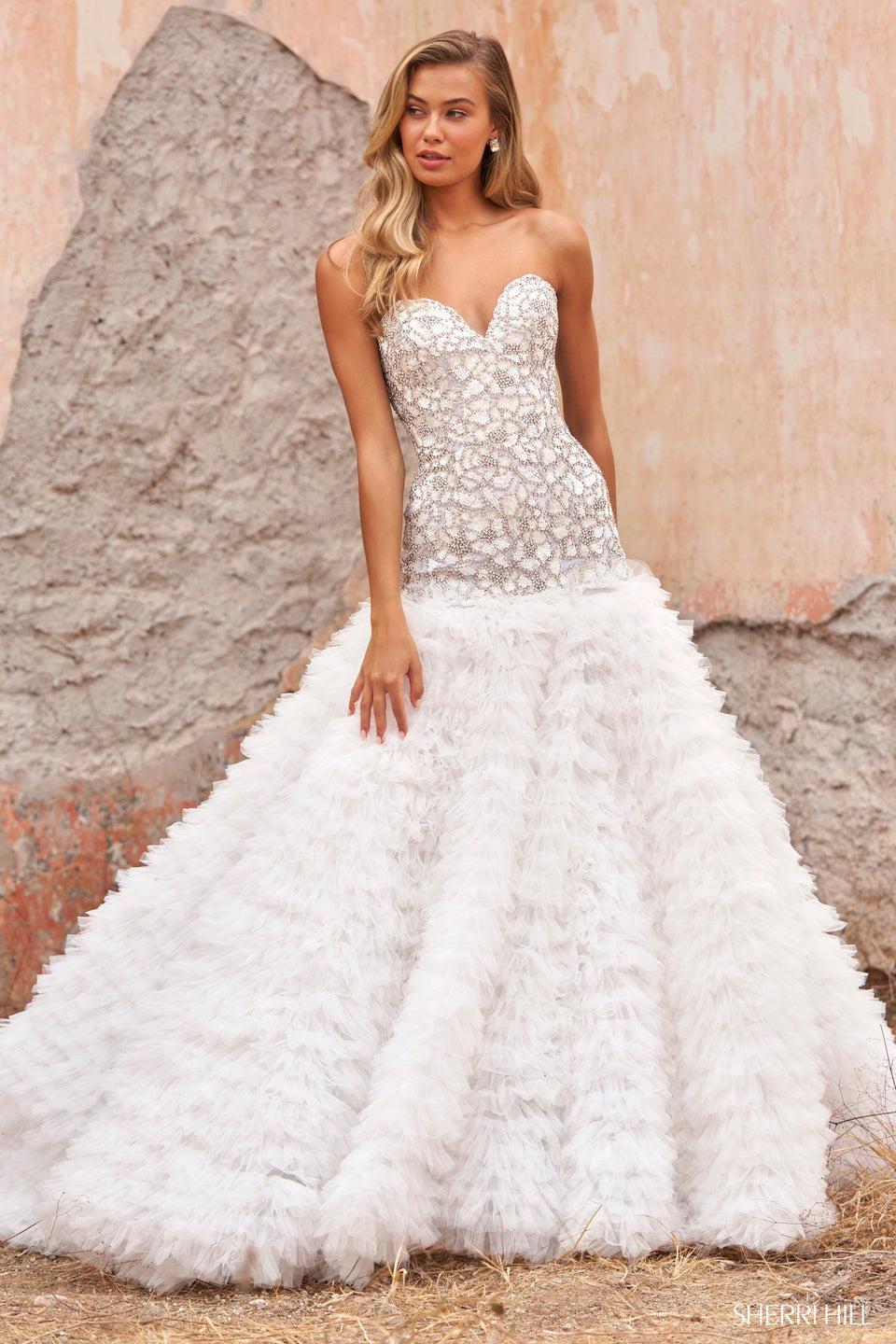 sherri hill Strapless sweetheart neckline with Swarovski beaded bodice and a mermaid ruffle skirt