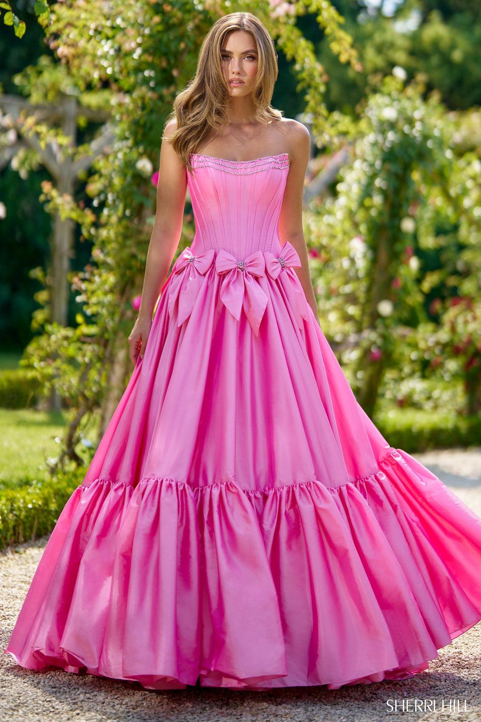 sherri hill Strapless taffeta ball gown with bow details and beaded embellishments