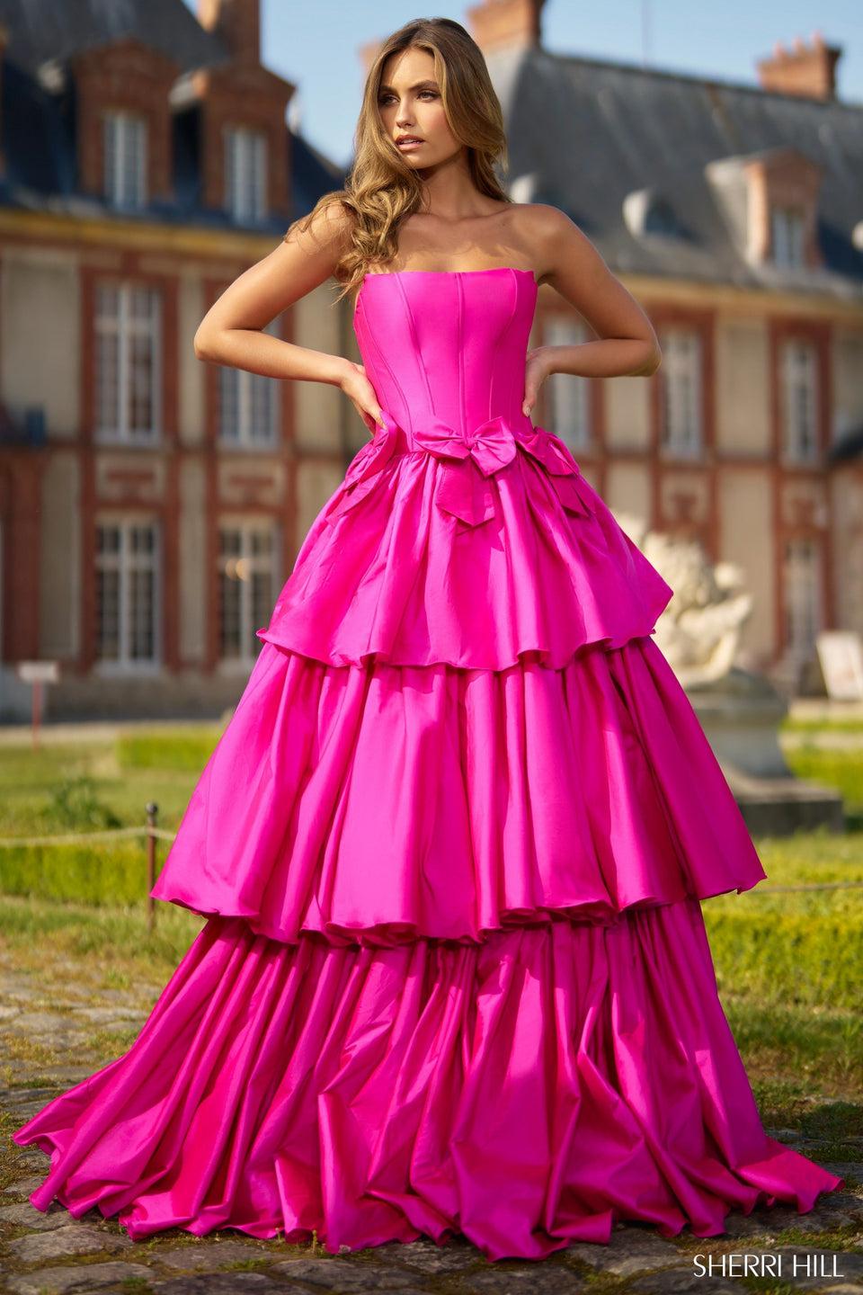 sherri hill Strapless taffeta ballgown with ruffle skirt corset bodice and bows on waistline