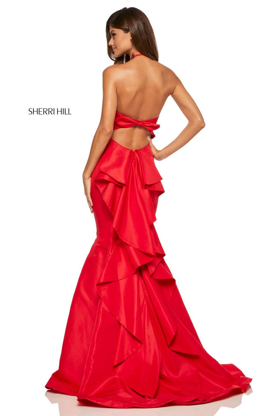 sherri hill Taffeta mermaid dress with a ruffles down the train and cut out bow back