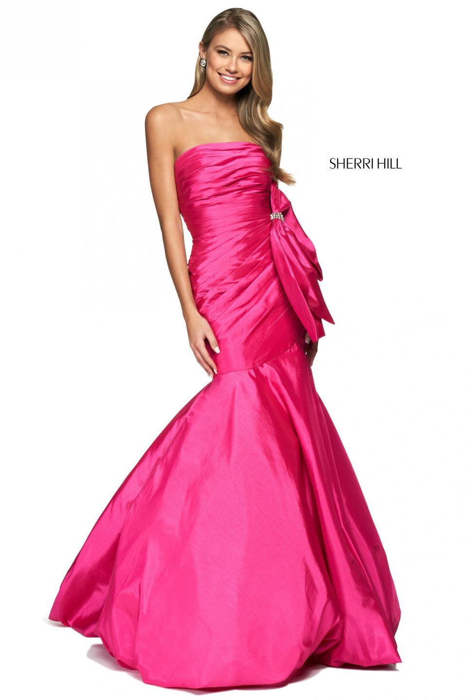 sherri hill Taffeta mermaid dress with strapless neckline pleated bodice and large embellished bow on the hip