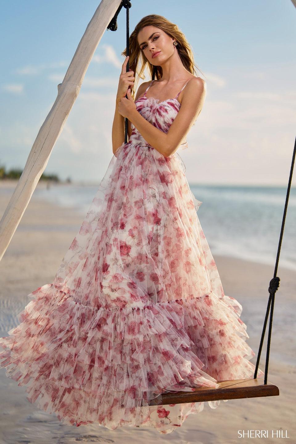 sherri hill Tulle A-line floral gown with keyhole rosette embellishment and a tiered ruffle skirt hem