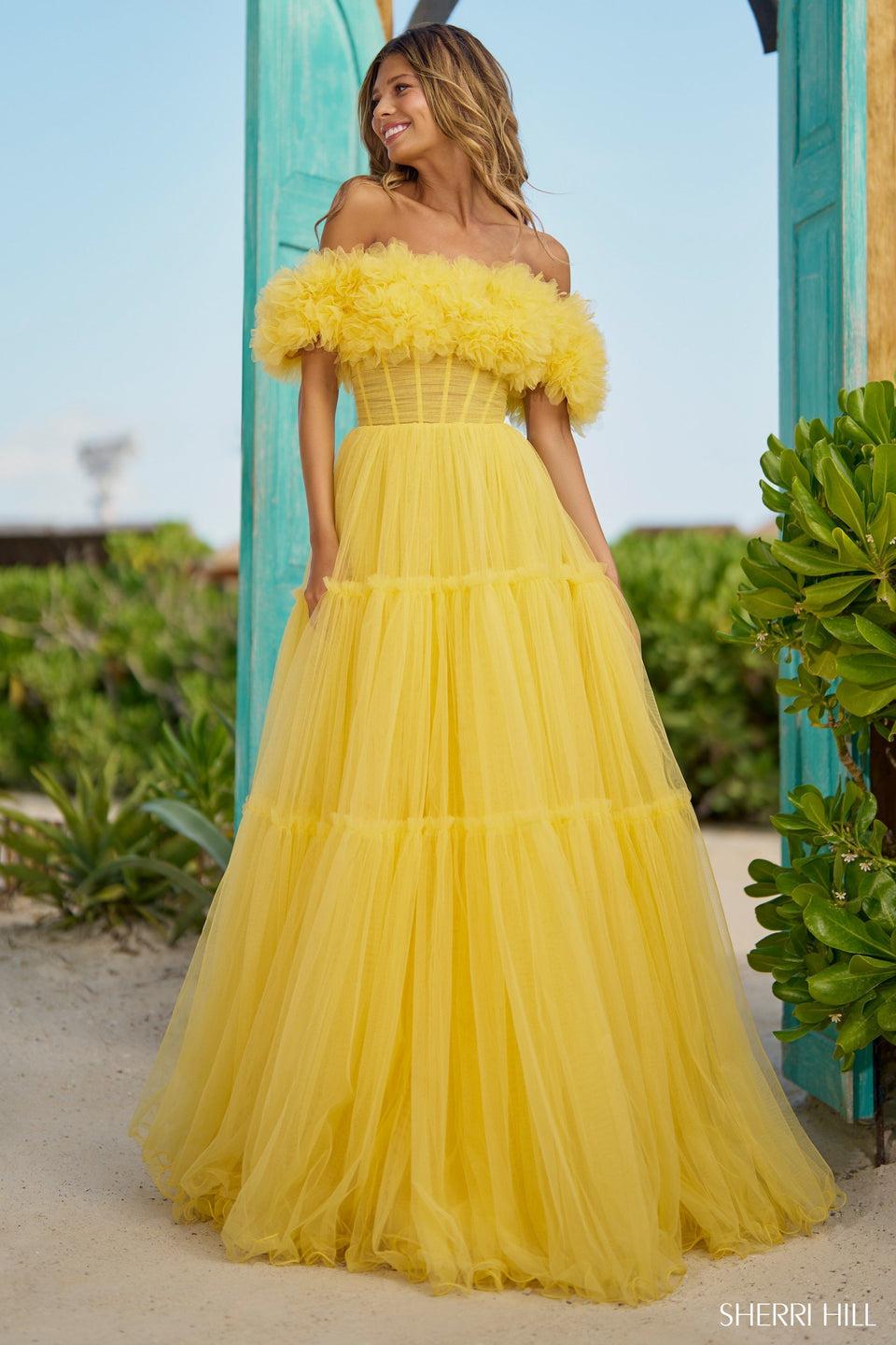 sherri hill Tulle A-line off the shoulder gown with tiered skirt and a corset bodice with rosette embellished top