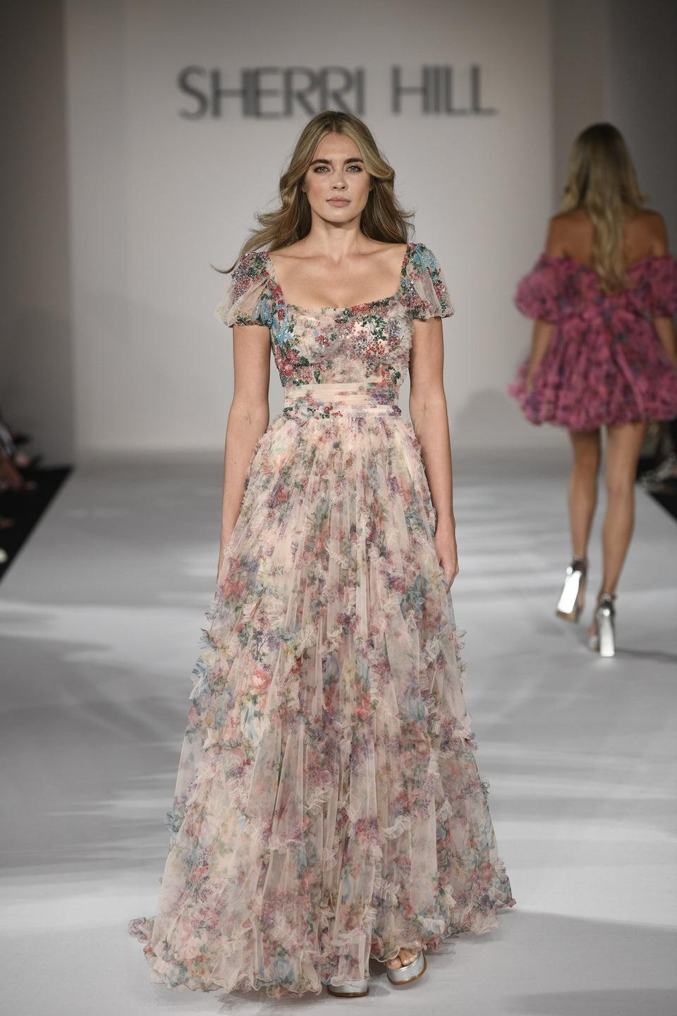 Sherri Hill Tulle Floral Print Gown With A Bead Embellished Bodice Ruffle Embellishments On Skirt And Cap Sleeves