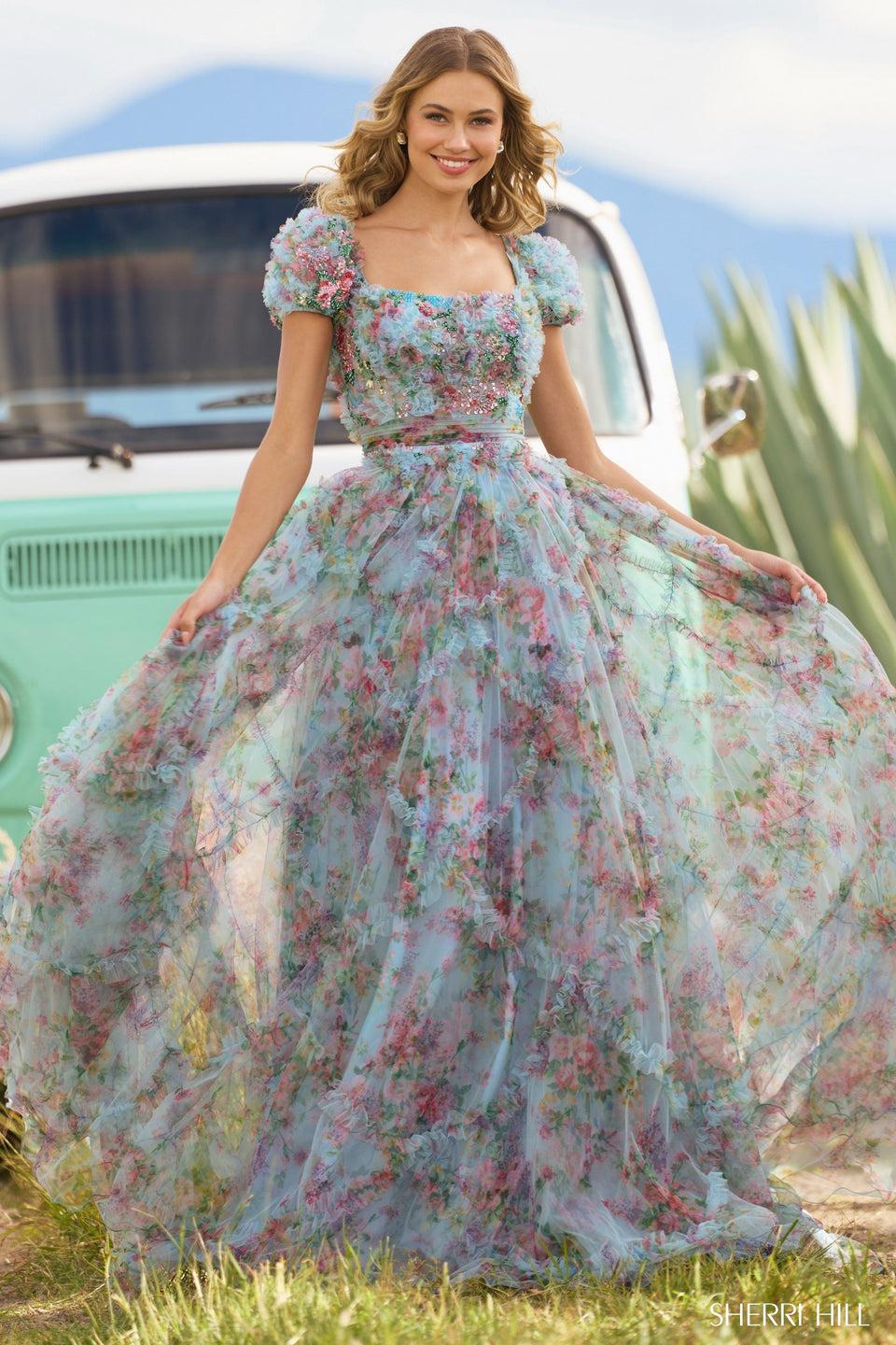 sherri hill Tulle floral print gown with a bead embellished bodice ruffle embellishments on skirt and cap sleeves