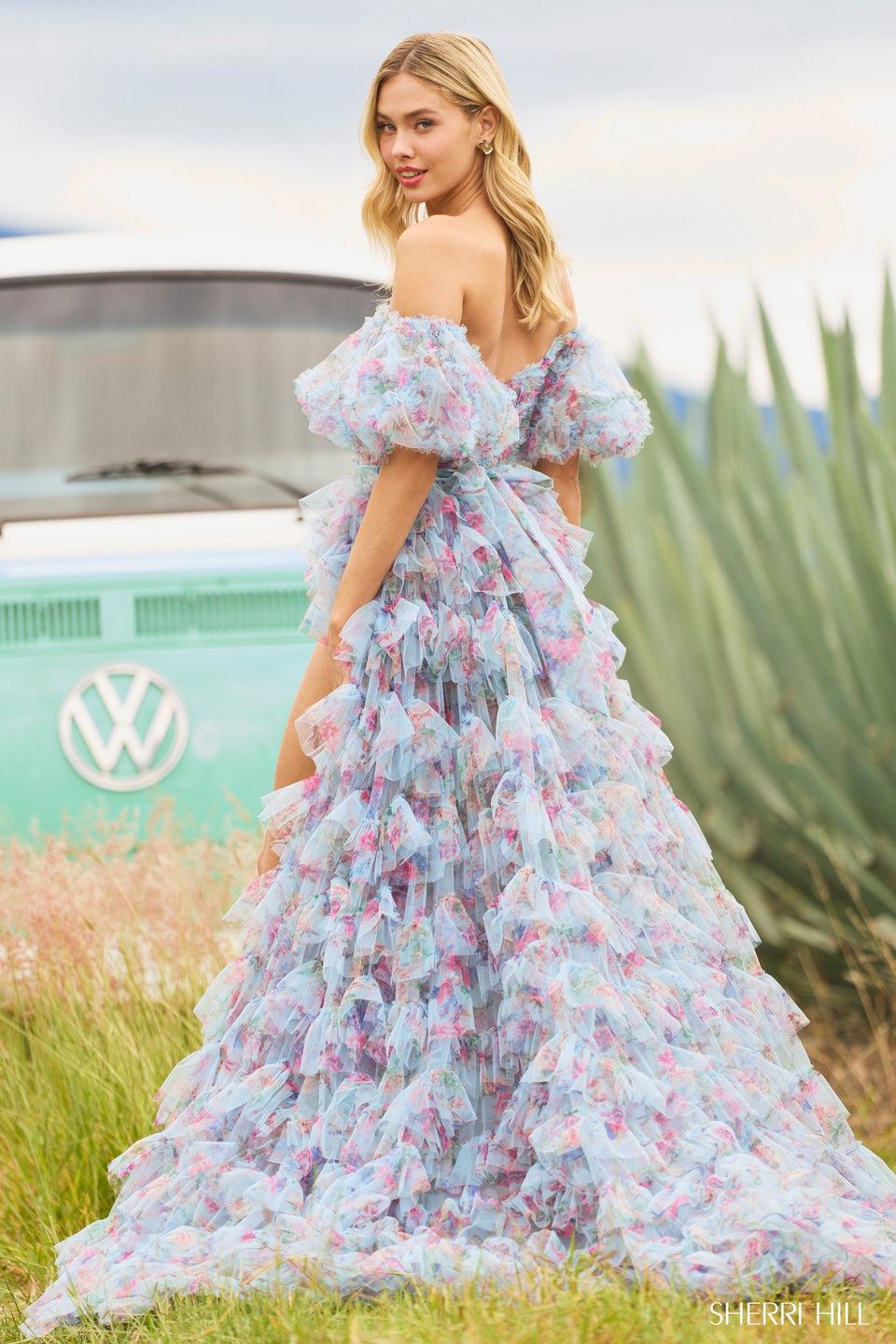 Sherri Hill Tulle Floral Print Gown With Sheer Corset Bodice Ballon Sleeves Ruffle Embellishments And High Skirt Slit