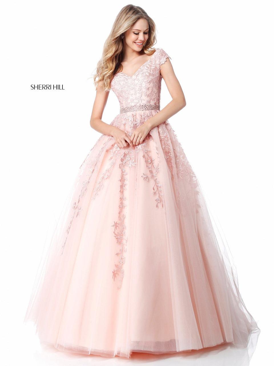 sherri hill Tulle flower appliqued ball gown with an off-the-shoulder bodice and bead encrusted belt