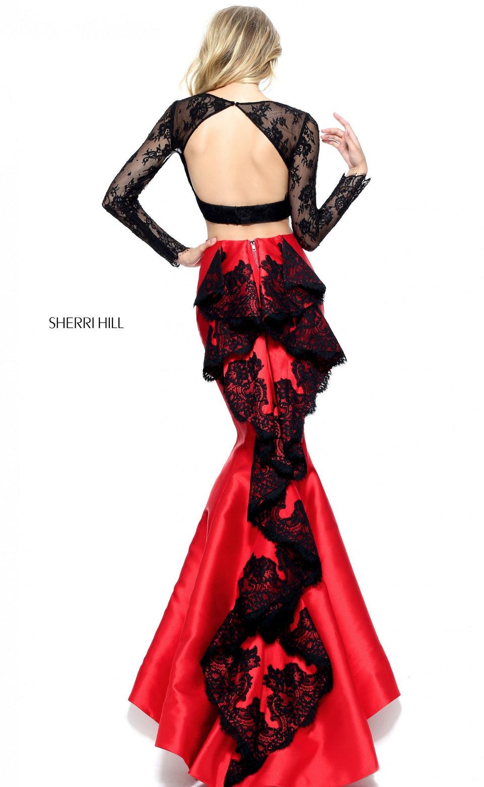sherri hill Two-piece mermaid with a lace long sleeve bodice and lace ruffle along the back of the skirt