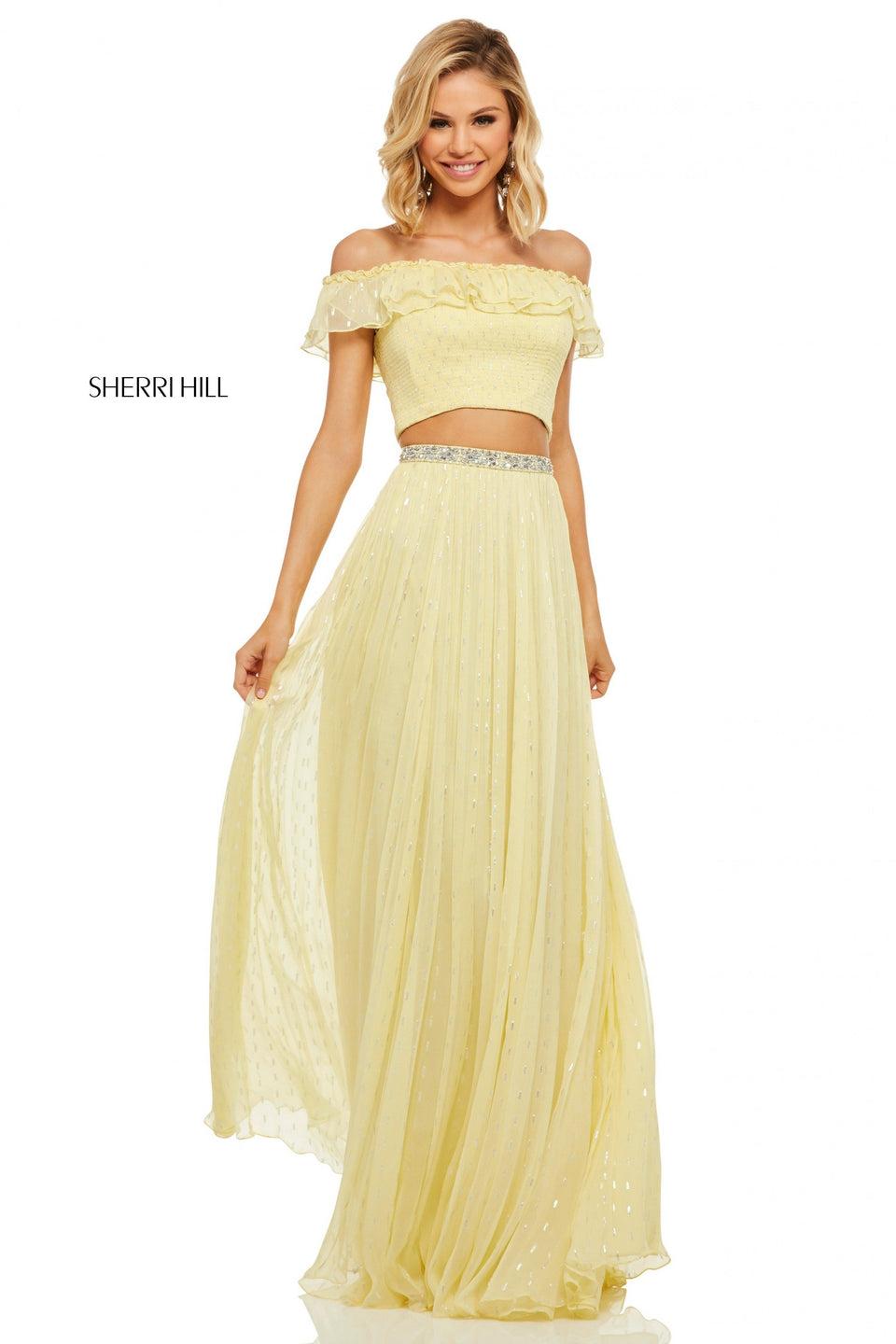 sherri hill Two-piece smocked off-the-shoulder top with ruffle neckline and chiffon skirt with jewel encrusted waistband and metallic print detail